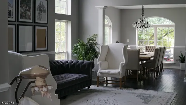 a view of a dining room with furniture and window