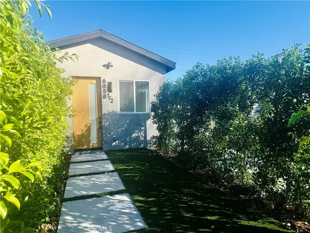 a view of a house with a plants