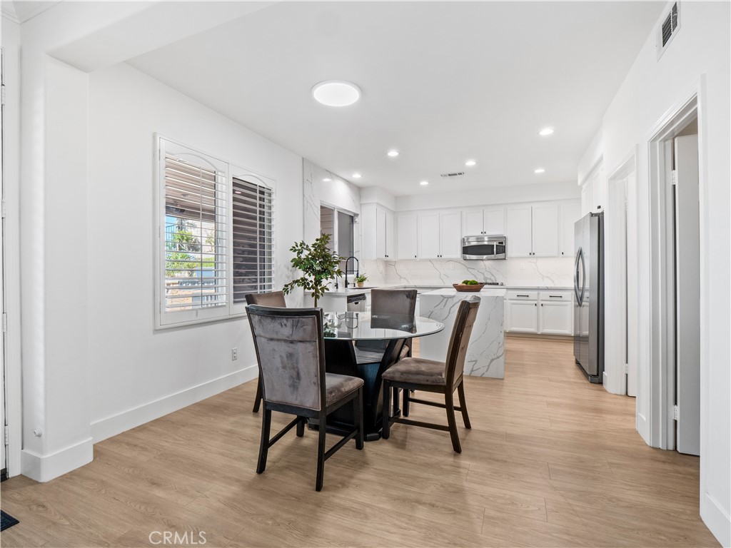 29461 Sequoia Road Canyon Country, CA 91387 - Photo 11 of 51 a dining room with furniture and window