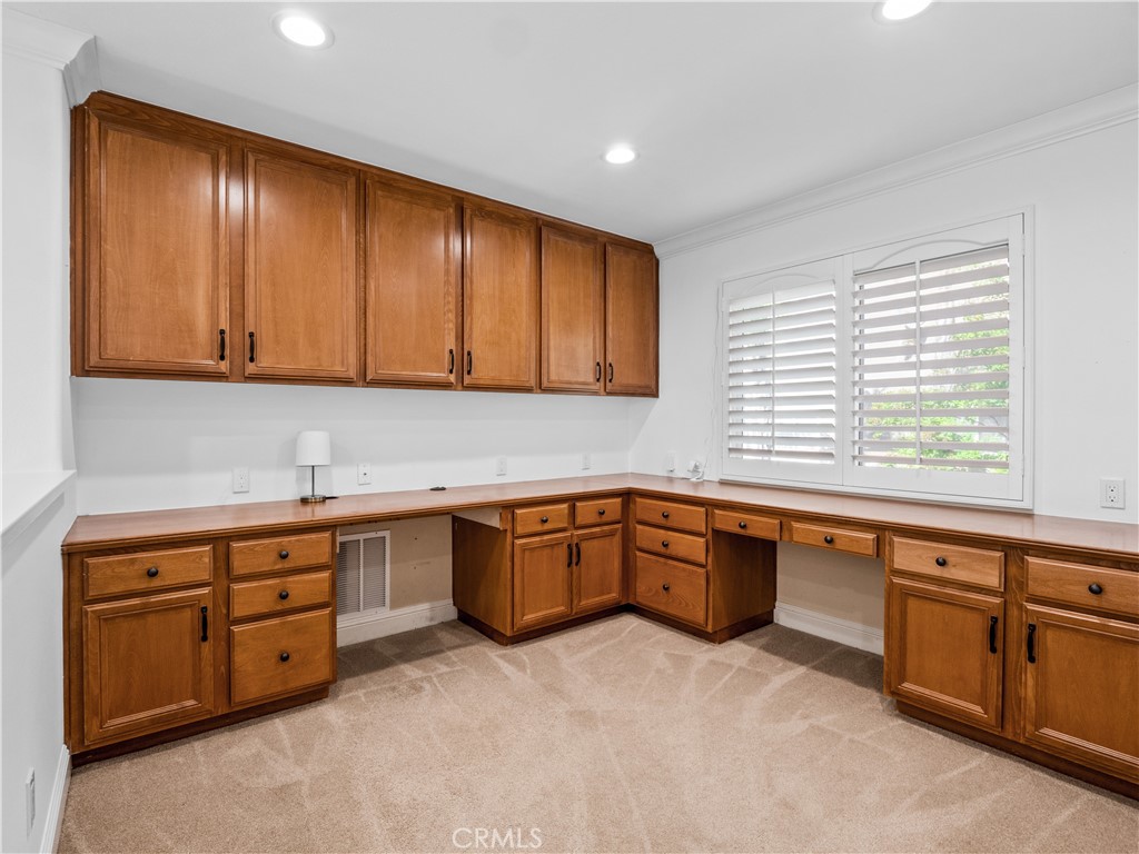 29461 Sequoia Road Canyon Country, CA 91387 - Photo 20 of 51 a kitchen with sink cabinets and window