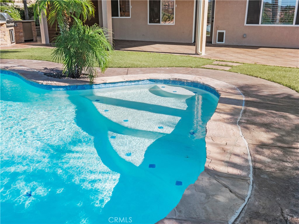 29461 Sequoia Road Canyon Country, CA 91387 - Photo 35 of 51 a view of a swimming pool with a yard
