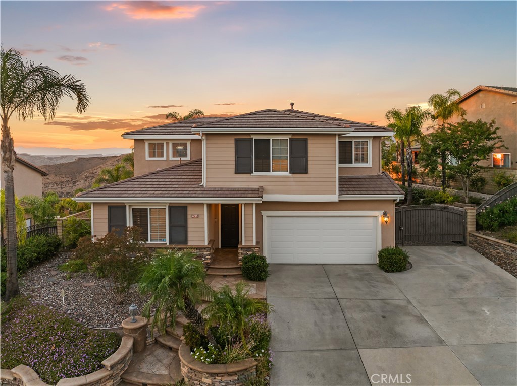 29461 Sequoia Road Canyon Country, CA 91387 - Photo 50 of 51 a front view of a house with a garden