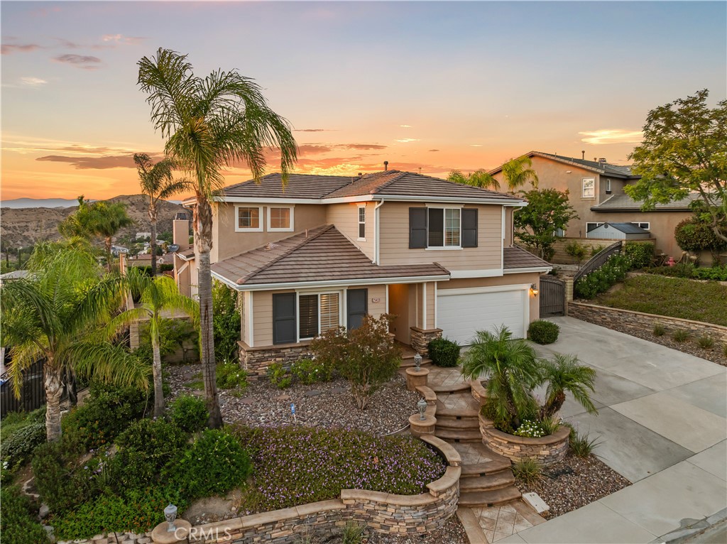 29461 Sequoia Road Canyon Country, CA 91387 - Photo 51 of 51 a front view of a house with a garden