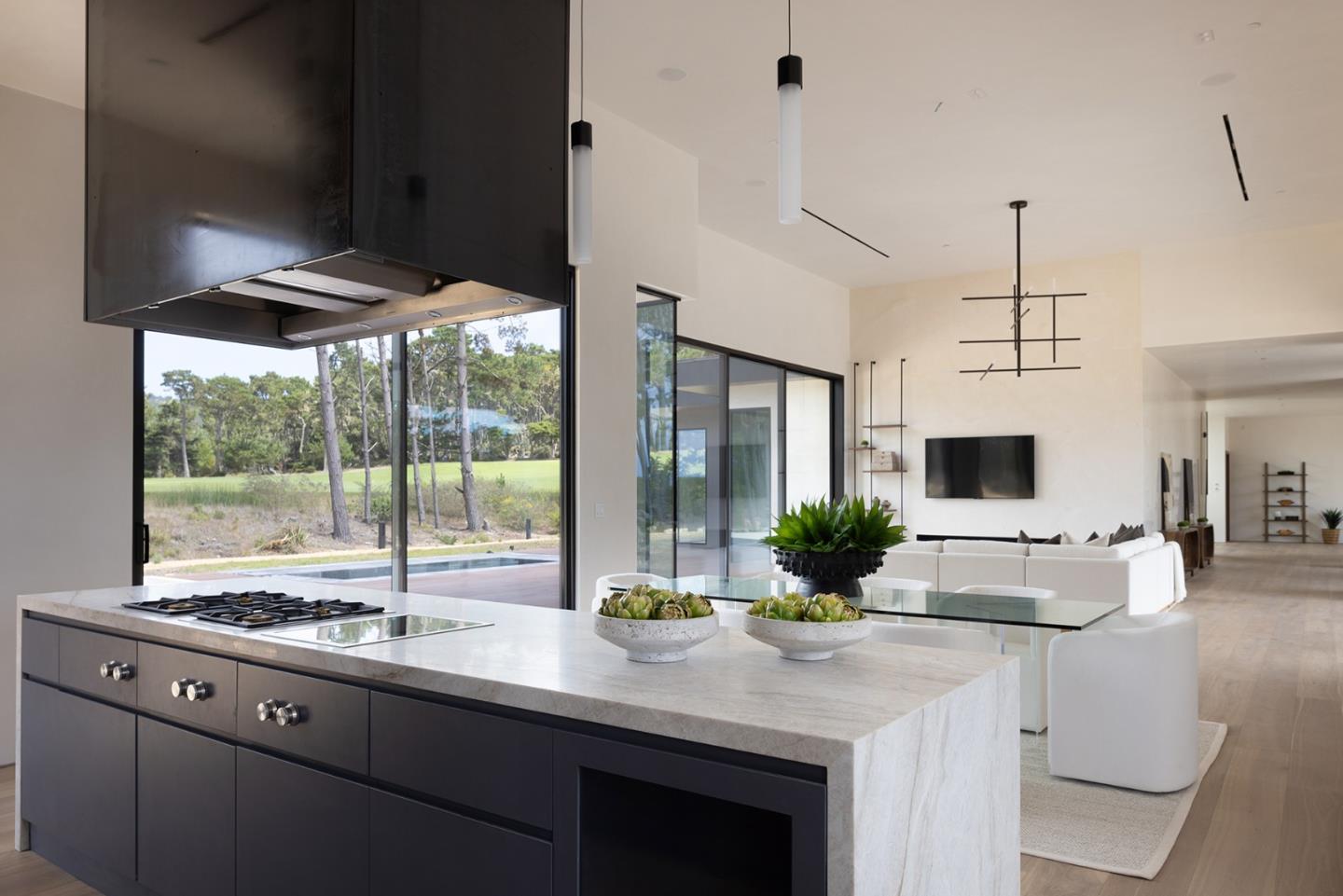 31 Poppy Lane Pebble Beach, CA 93953 - Photo 15 of 45 a kitchen with sink and large window