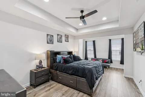 a bedroom with bed and window