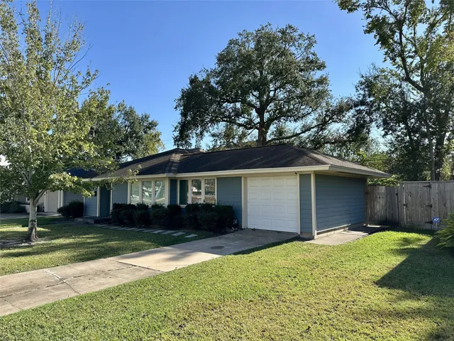 front view of a house and a yard