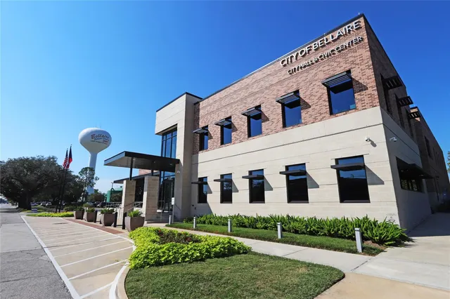 a view of a building with a yard