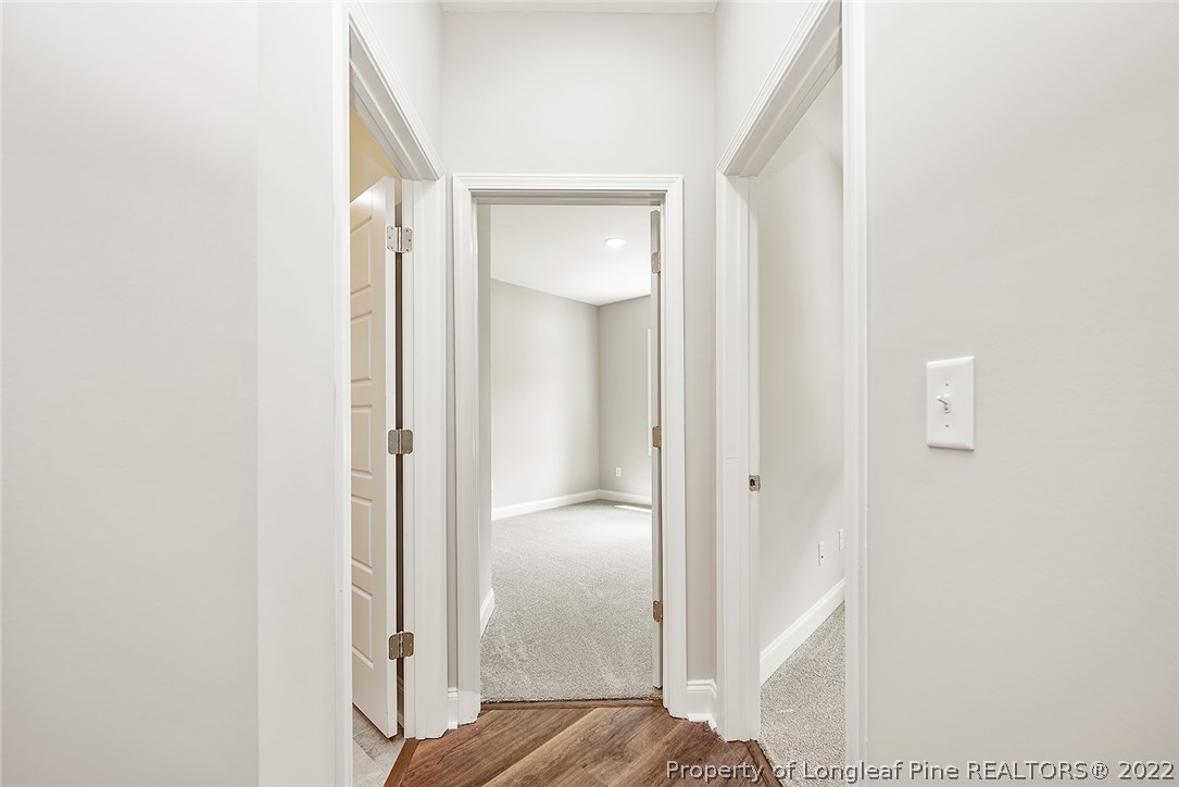 7668 Rufus Johnson Road Fayetteville, NC 28306 - Photo 13 of 29 a view of a bathroom from a hallway