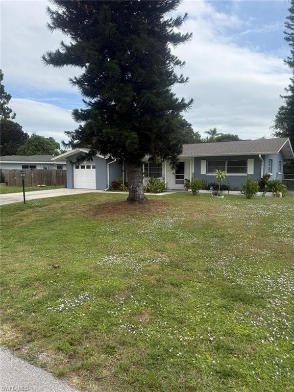 4454 19th Place Southwest Naples, FL 34116 - Photo 27 of 30 a view of a house with a big yard