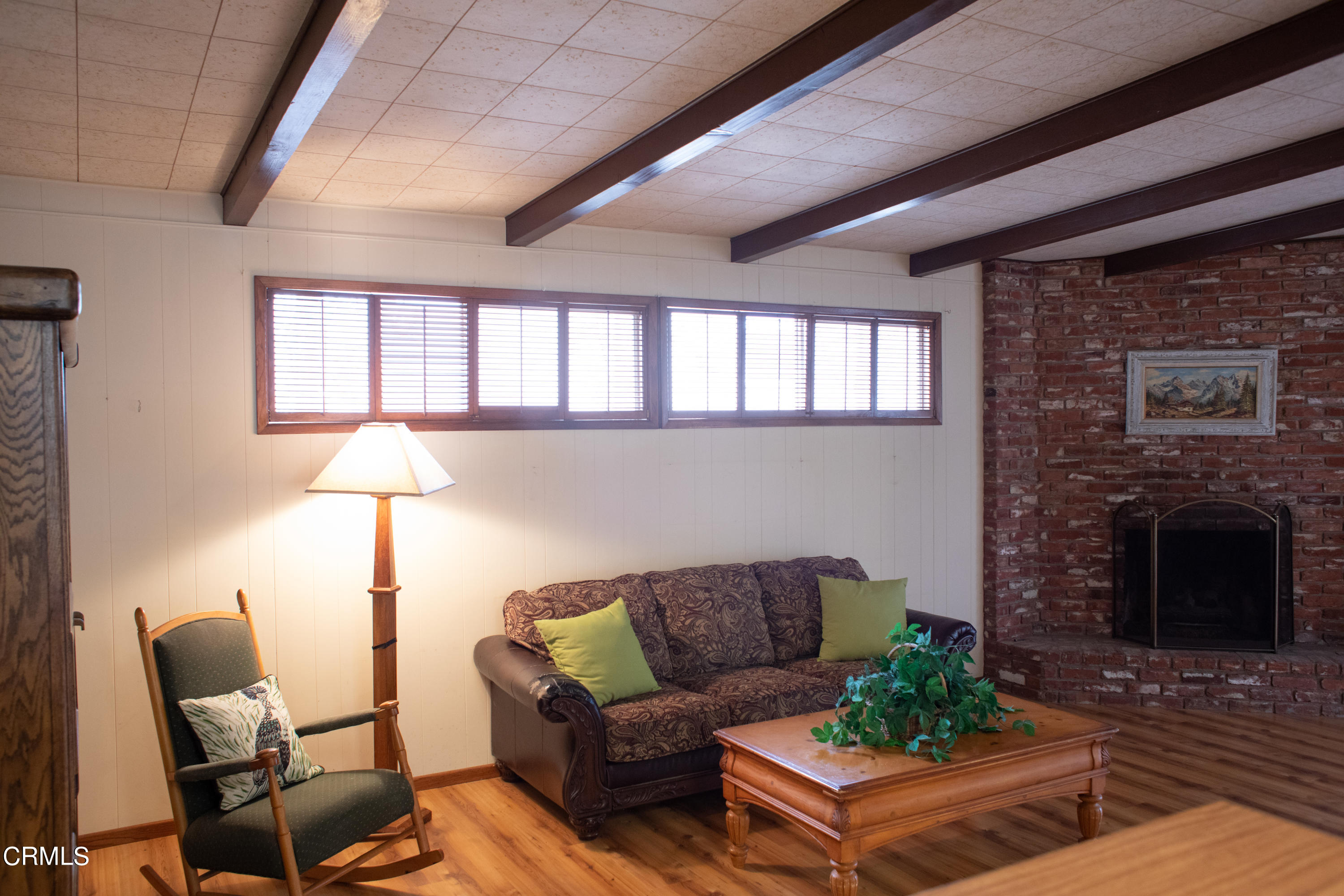 117 Kenneth Street Camarillo, CA 93010 - Photo 11 of 24 a living room with furniture and a fireplace