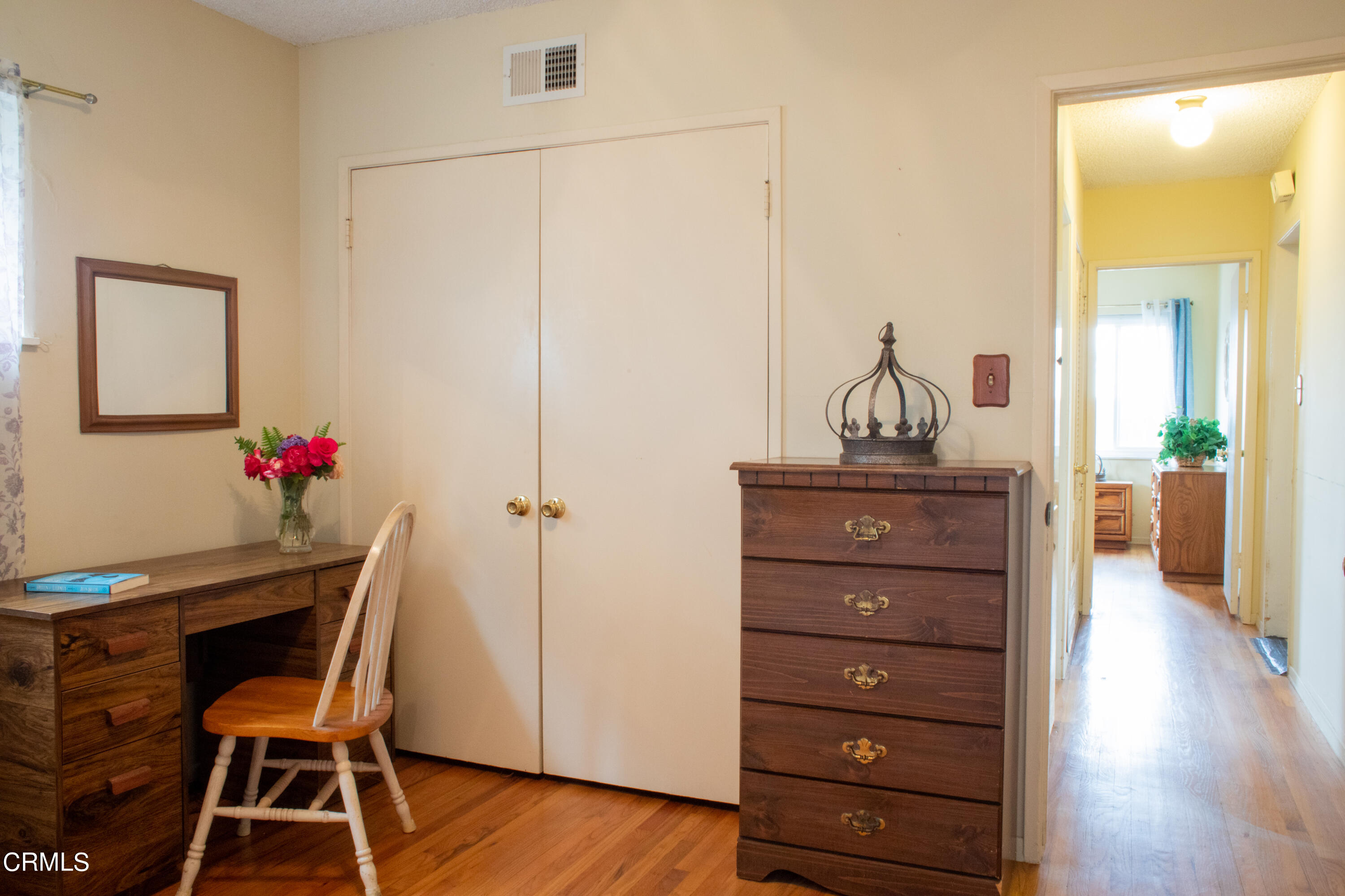 117 Kenneth Street Camarillo, CA 93010 - Photo 18 of 24 a view of a workspace room with wooden floor and cabinet