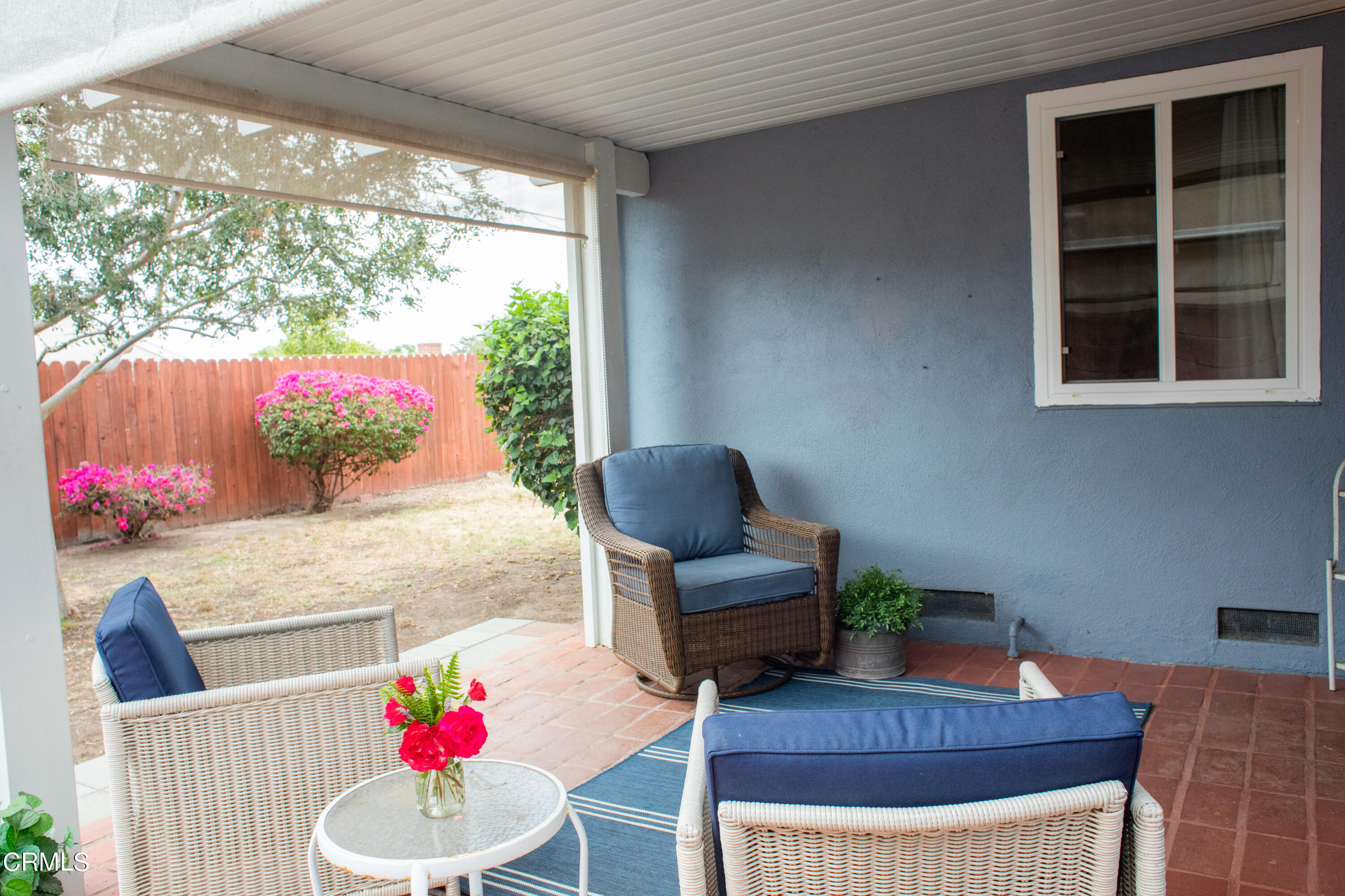 117 Kenneth Street Camarillo, CA 93010 - Photo 20 of 24 a living room with furniture and a floor to ceiling window
