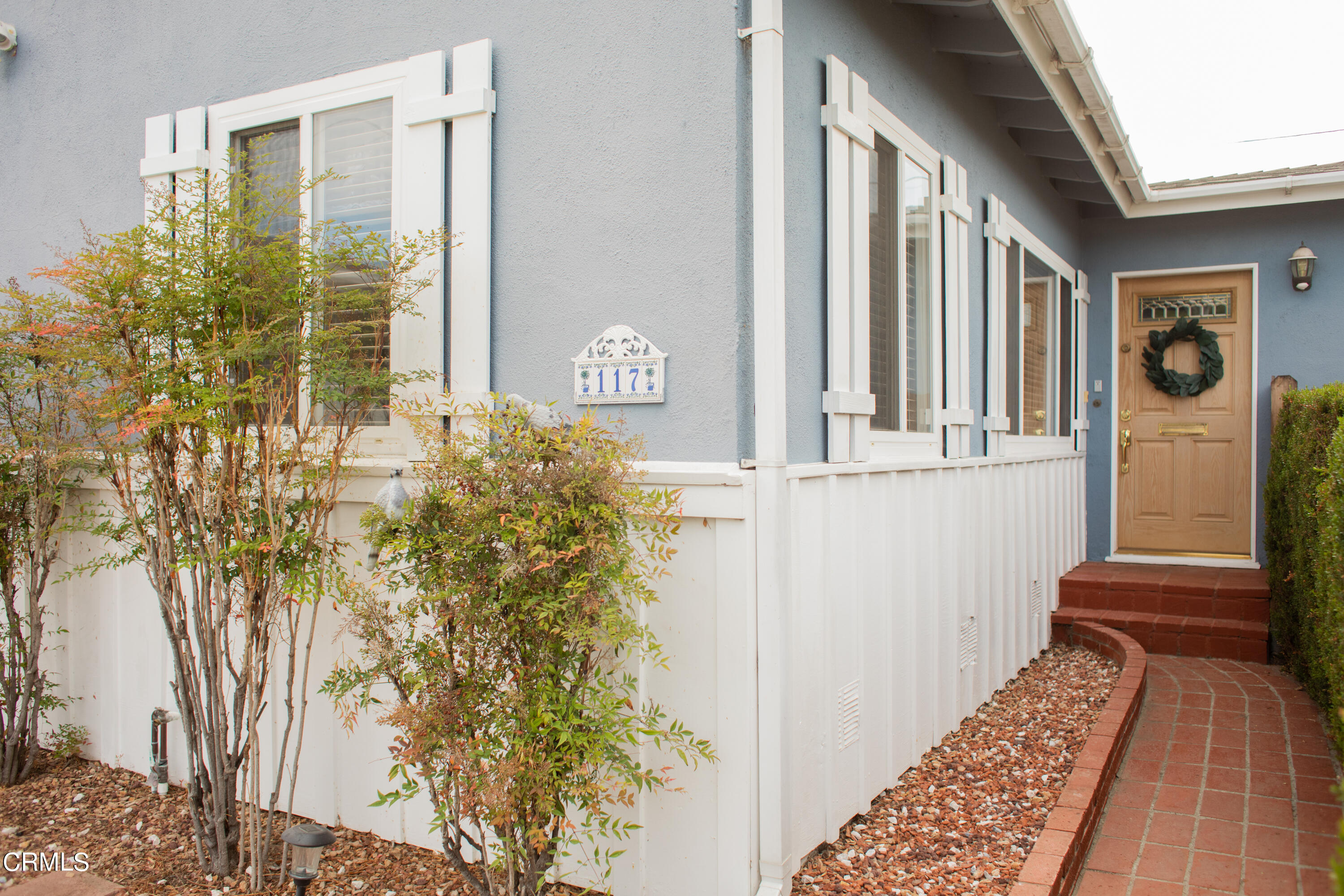 117 Kenneth Street Camarillo, CA 93010 - Photo 3 of 24 front view of a house with a yard