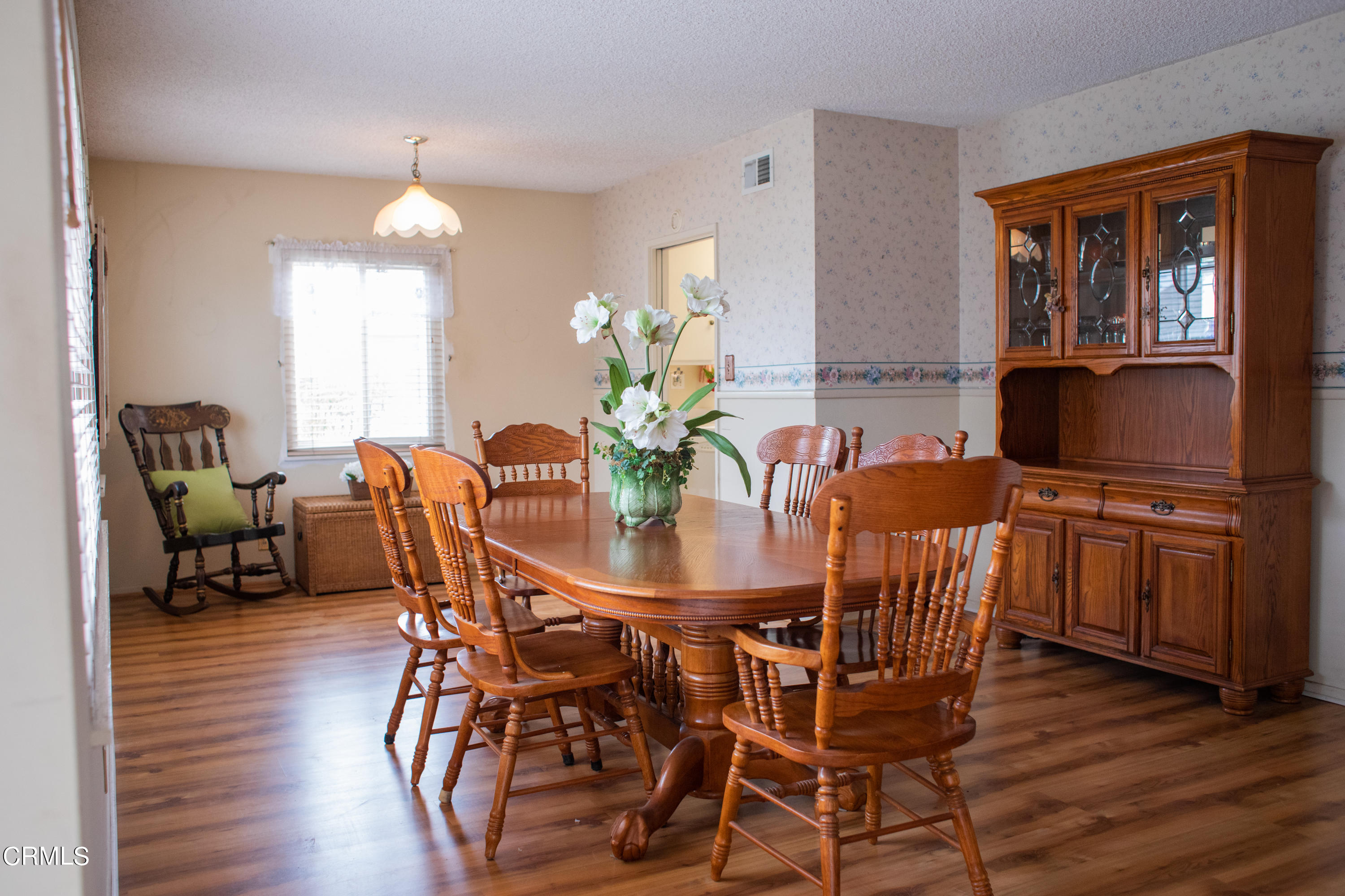 117 Kenneth Street Camarillo, CA 93010 - Photo 4 of 24 a view of a dining room with furniture window and wooden floor