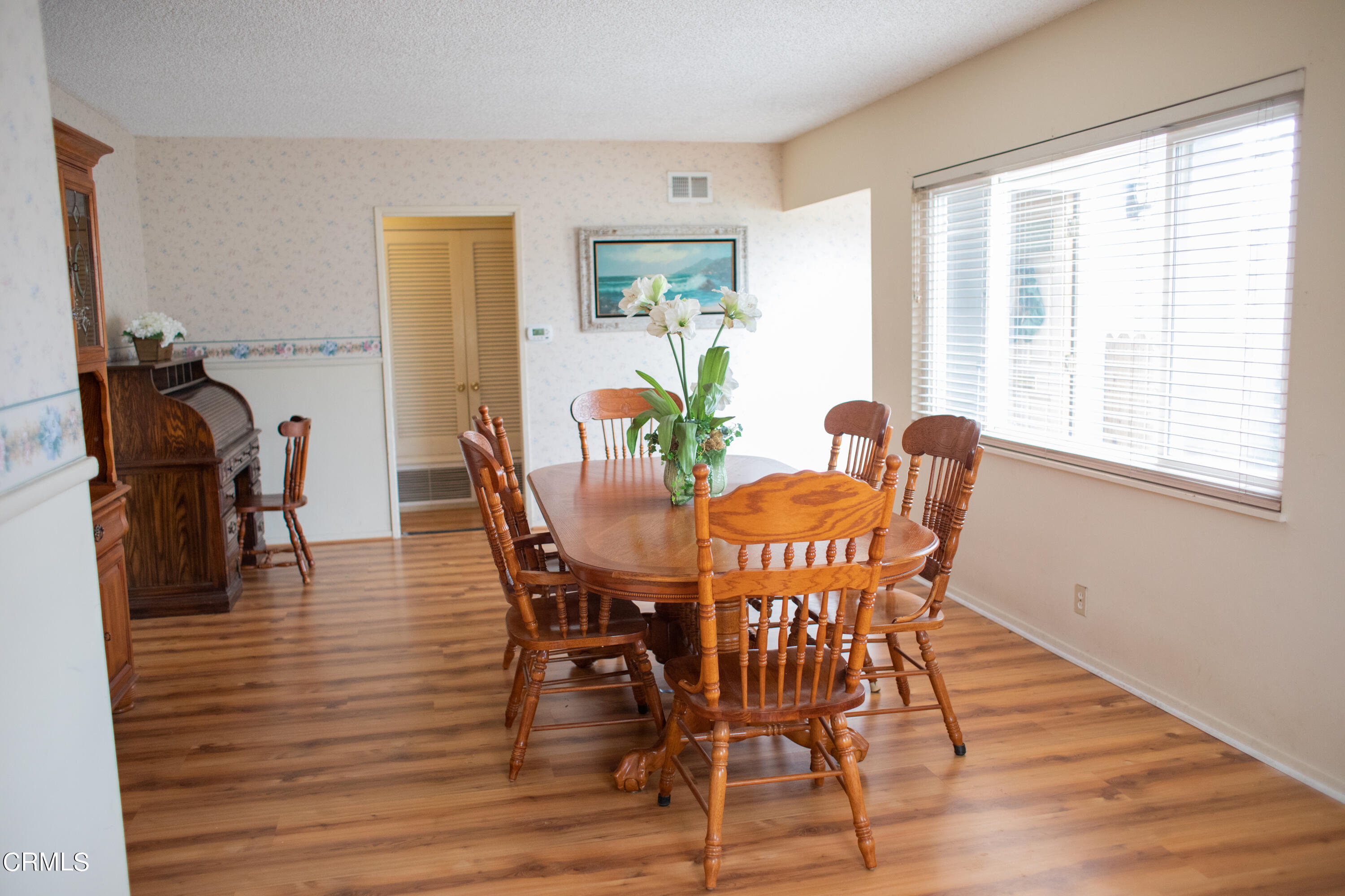 117 Kenneth Street Camarillo, CA 93010 - Photo 6 of 24 a view of a dining room with furniture and wooden floor