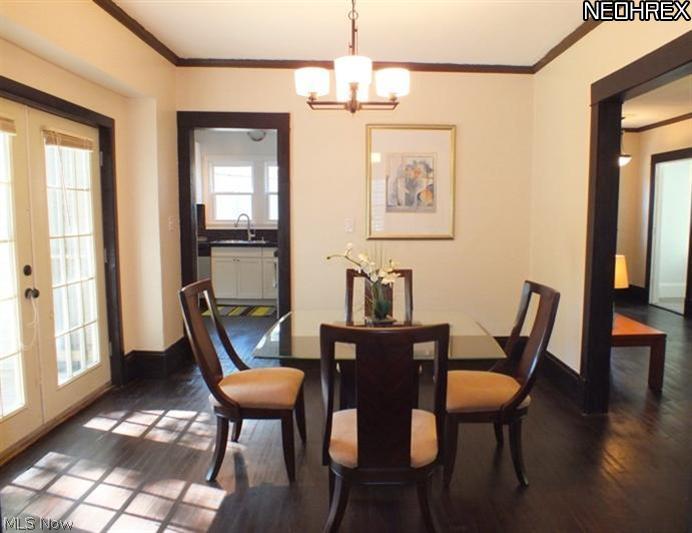 3212 Redwood Road Cleveland Heights, OH 44118 - Photo 7 of 19 Formal Dining Room with doors to rear deck and beautiful built-in's