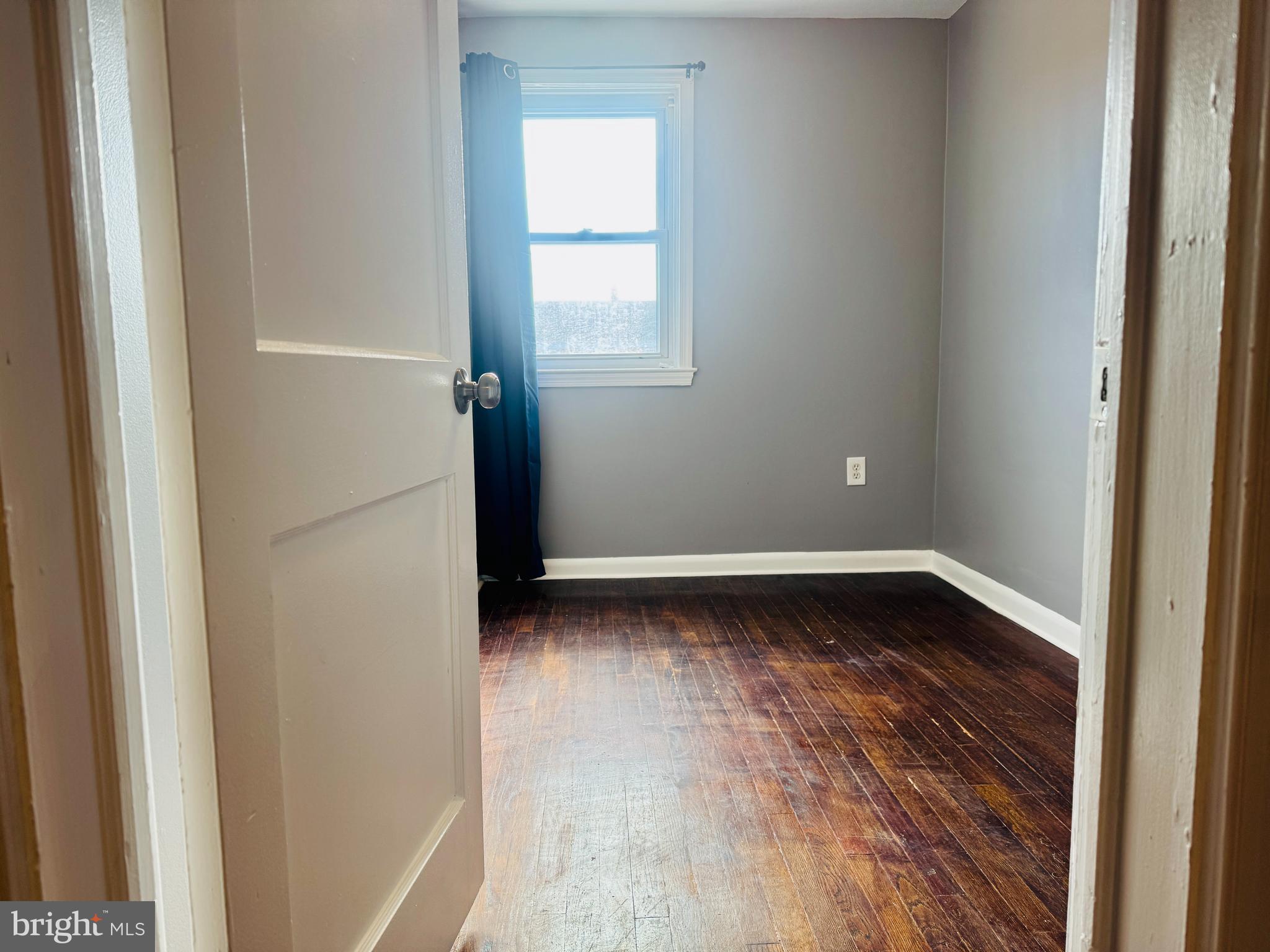 2111 Vailthorn Road Middle River, MD 21220 - Photo 11 of 17 a view of a small space with wooden floor and a window
