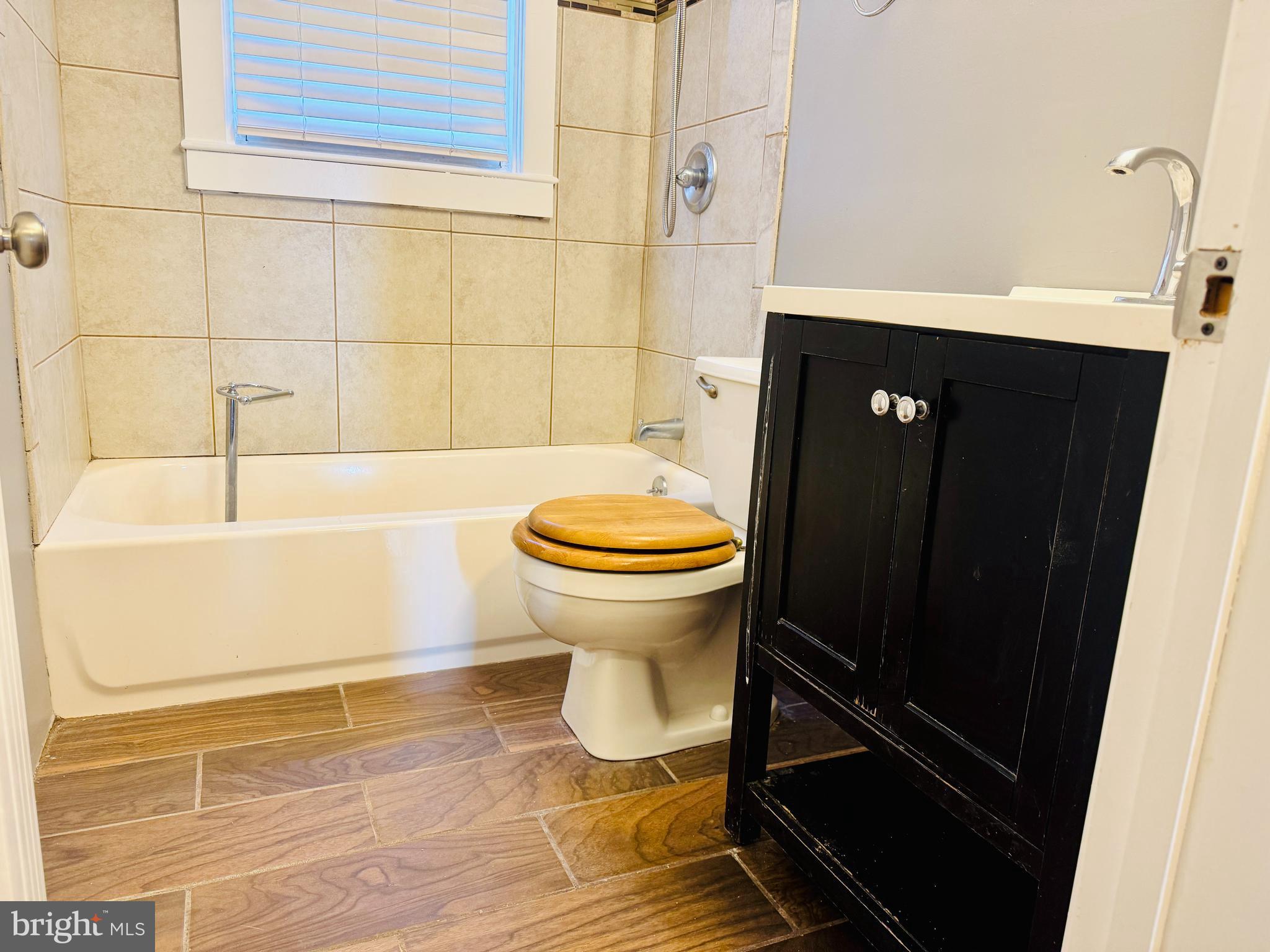 2111 Vailthorn Road Middle River, MD 21220 - Photo 13 of 17 a bathroom with a sink and a toilet