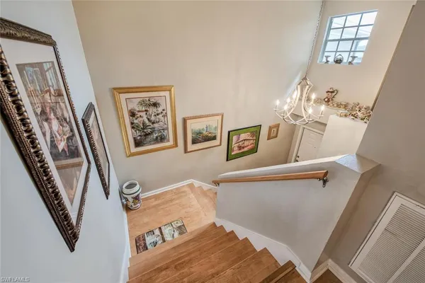 a view of a livingroom with furniture and windows