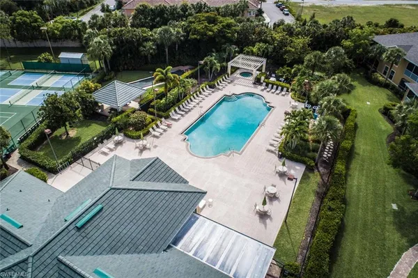 an aerial view of a house having yard