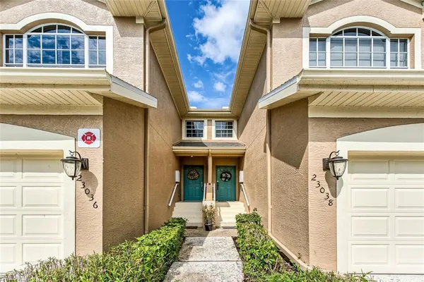 a front view of a house with a porch