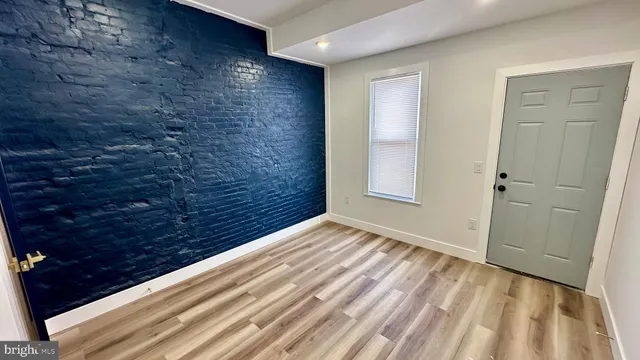 a bathroom with a bathtub and a sink