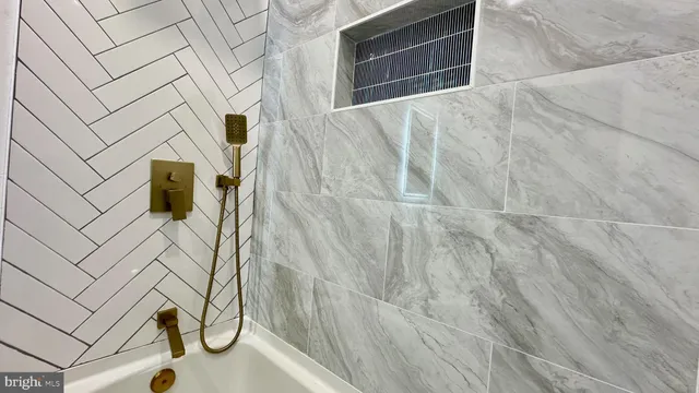 a view of a chair and table in the balcony