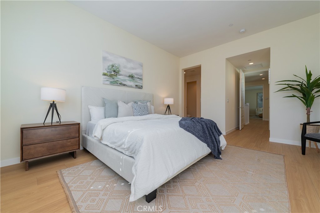 184 Terrapin Irvine, CA 92618 - Photo 21 of 74 a bedroom with a bed and a painting on the wall