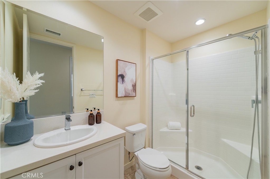 184 Terrapin Irvine, CA 92618 - Photo 25 of 74 a bathroom with a sink a toilet and shower