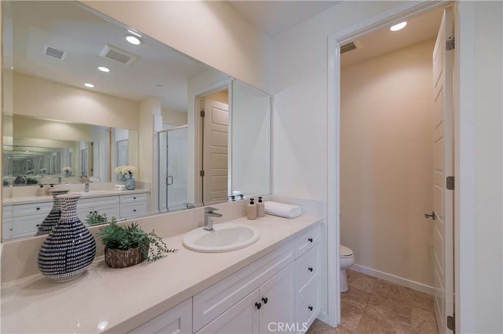 184 Terrapin Irvine, CA 92618 - Photo 26 of 74 a bathroom with a sink and a mirror