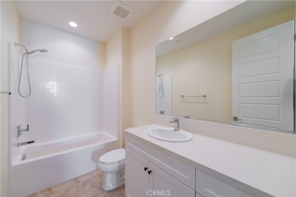 184 Terrapin Irvine, CA 92618 - Photo 30 of 74 a bathroom with a sink a toilet and shower
