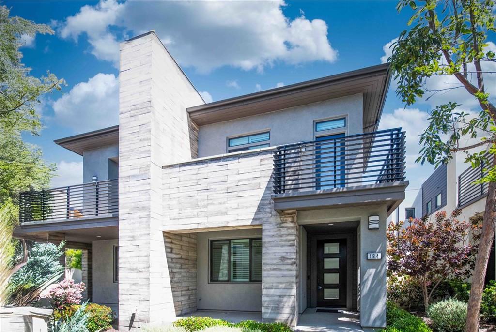 184 Terrapin Irvine, CA 92618 - Photo 3 of 74 a view of a house with potted plants and a table and chairs