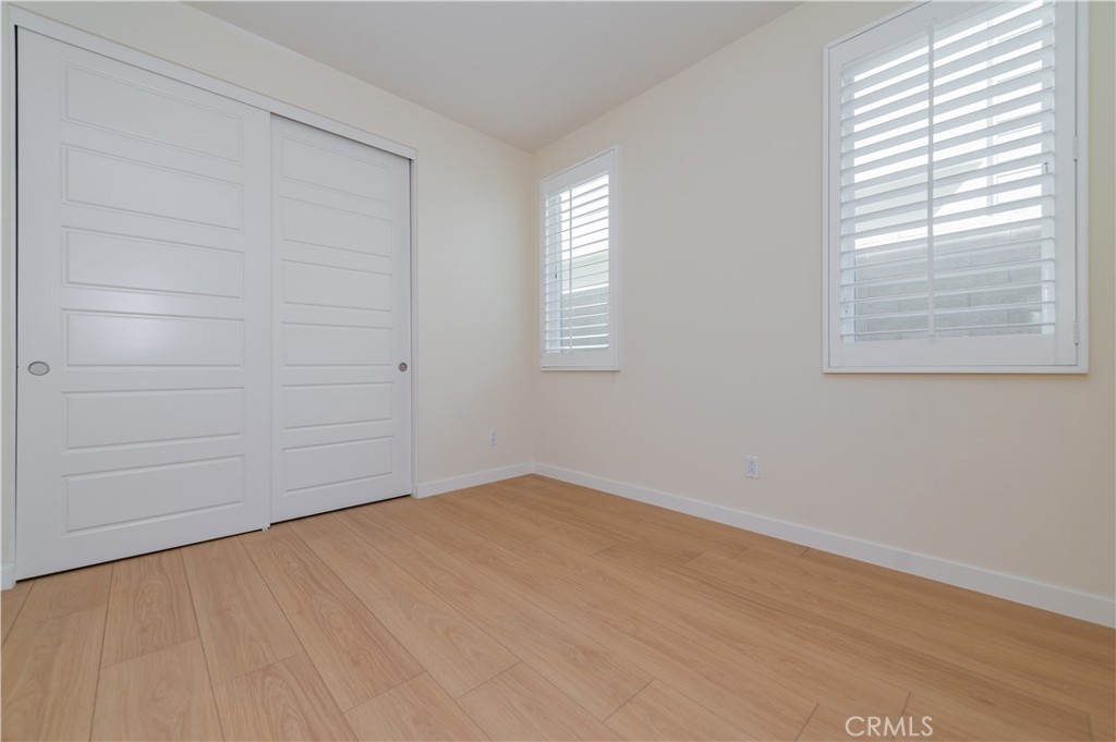 184 Terrapin Irvine, CA 92618 - Photo 33 of 74 wooden floor in an empty room with a window
