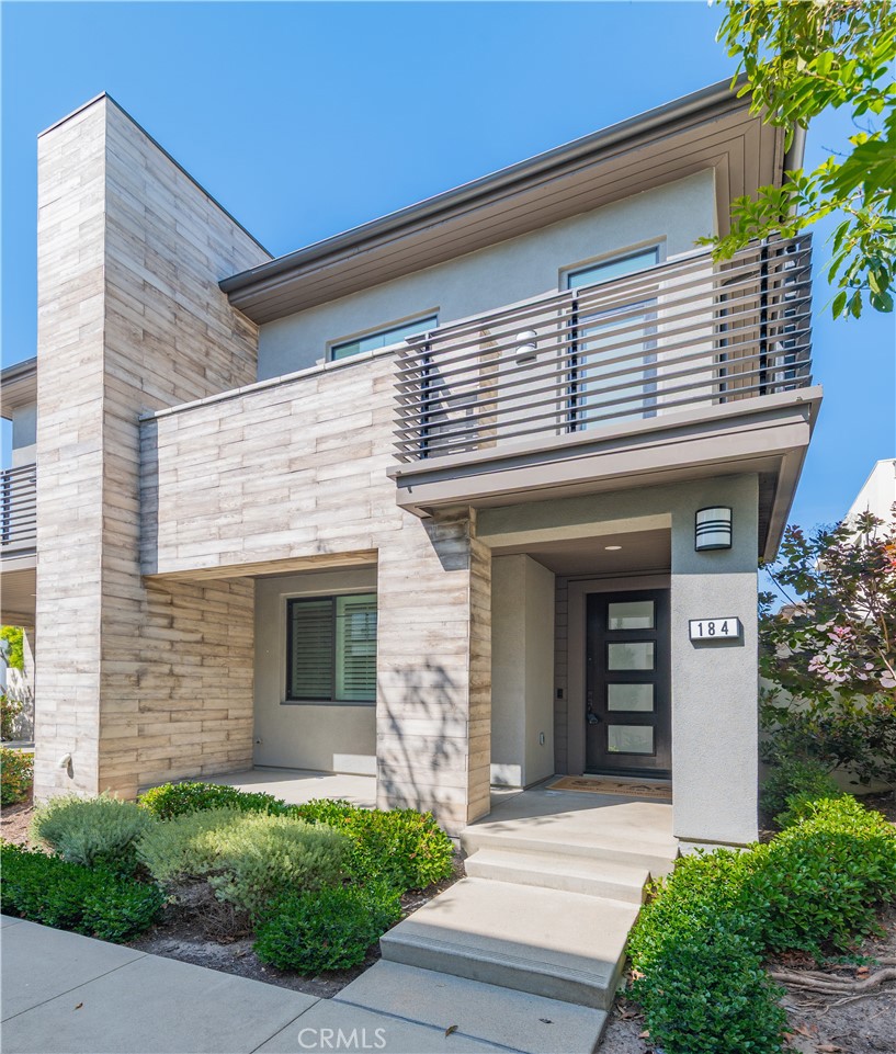 184 Terrapin Irvine, CA 92618 - Photo 37 of 74 a front view of a house with a yard and garage