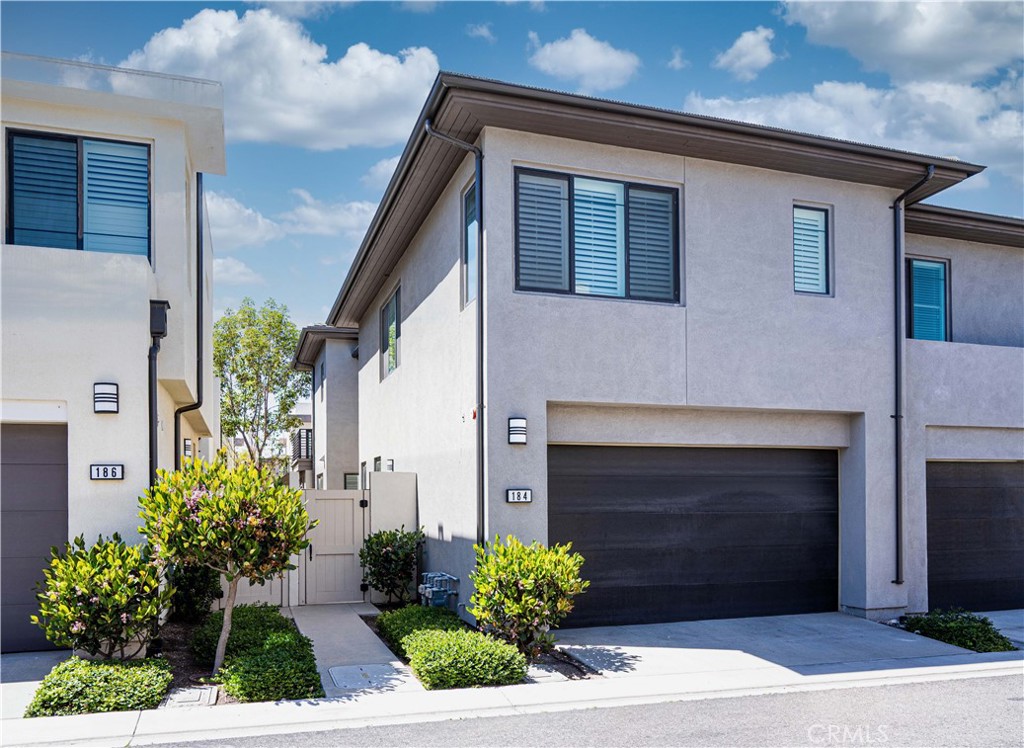 184 Terrapin Irvine, CA 92618 - Photo 40 of 74 a front view of a house with a yard