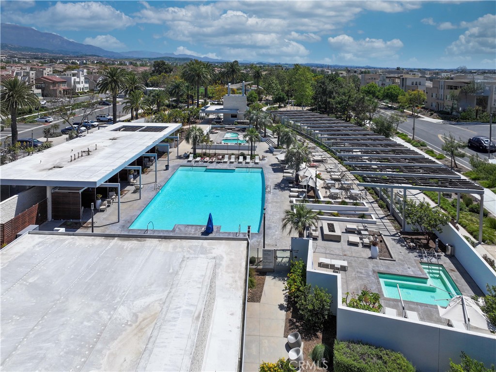 184 Terrapin Irvine, CA 92618 - Photo 53 of 74 an aerial view of a house with a garden space and lake view