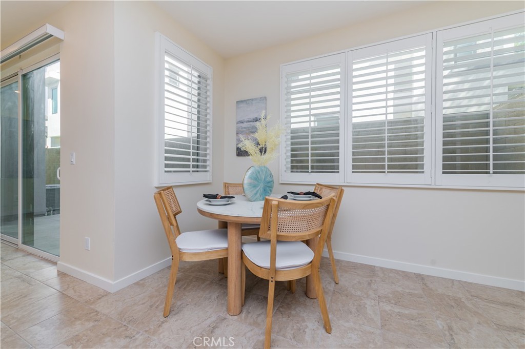 184 Terrapin Irvine, CA 92618 - Photo 9 of 74 a dining room with furniture and windows