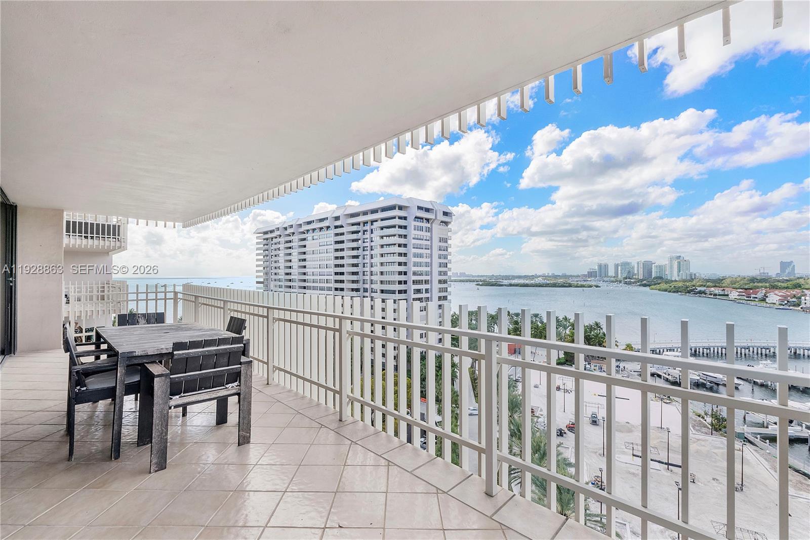 2 Grove Isle Drive, Unit B1110 Miami, FL 33133 - Photo 18 of 29 a view of a balcony with chairs