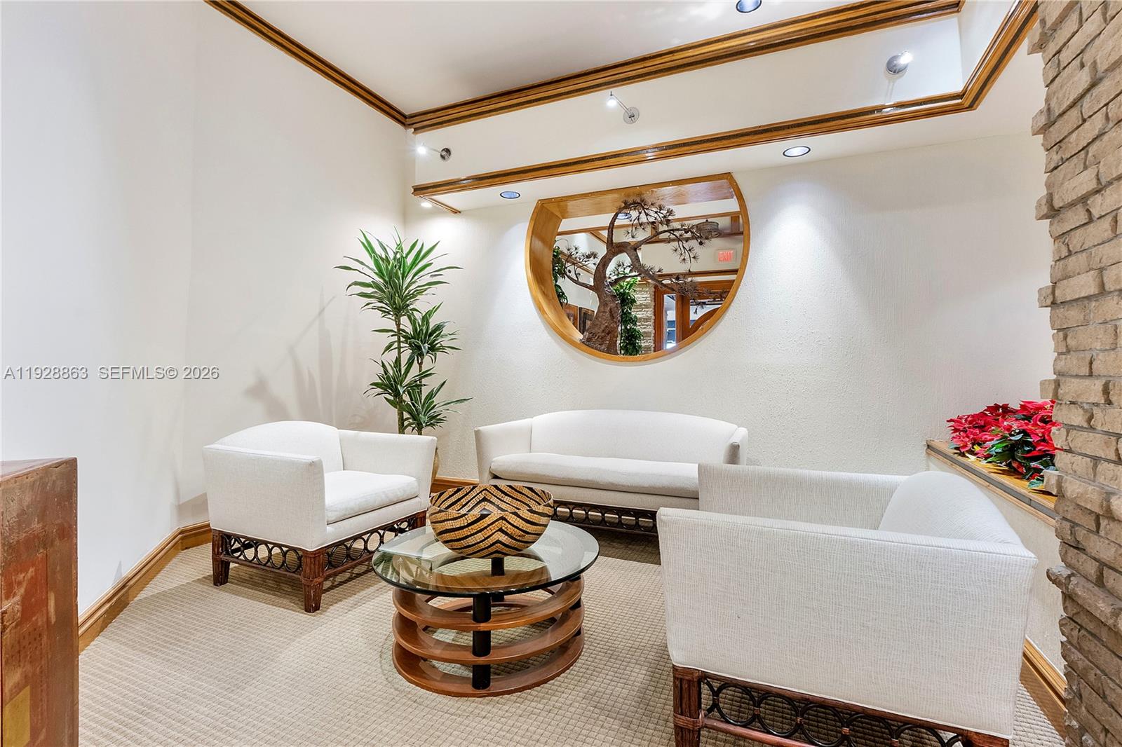 2 Grove Isle Drive, Unit B1110 Miami, FL 33133 - Photo 25 of 29 a living room with furniture and a potted plant