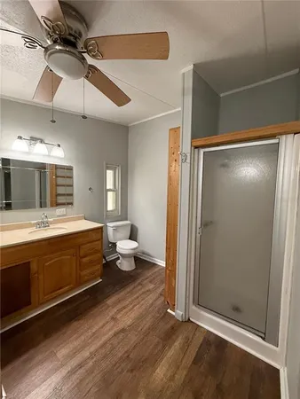 a bathroom with a double vanity sink a mirror and a bathtub