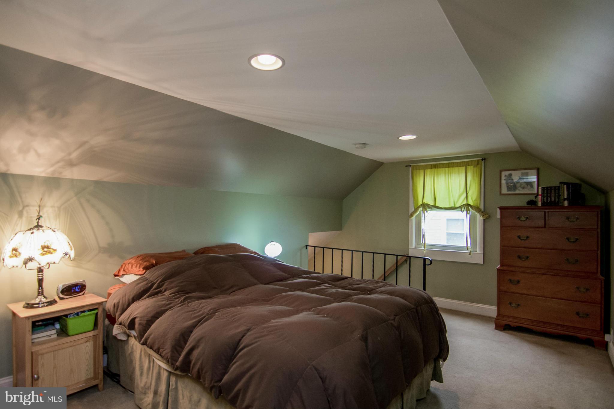 5544 Gayland Road Baltimore, MD 21227 - Photo 11 of 24 a bedroom with a bed and a dresser