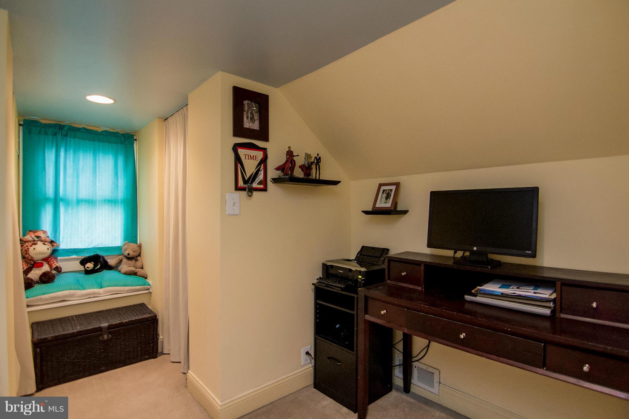 5544 Gayland Road Baltimore, MD 21227 - Photo 12 of 24 a room with furniture and flat screen tv