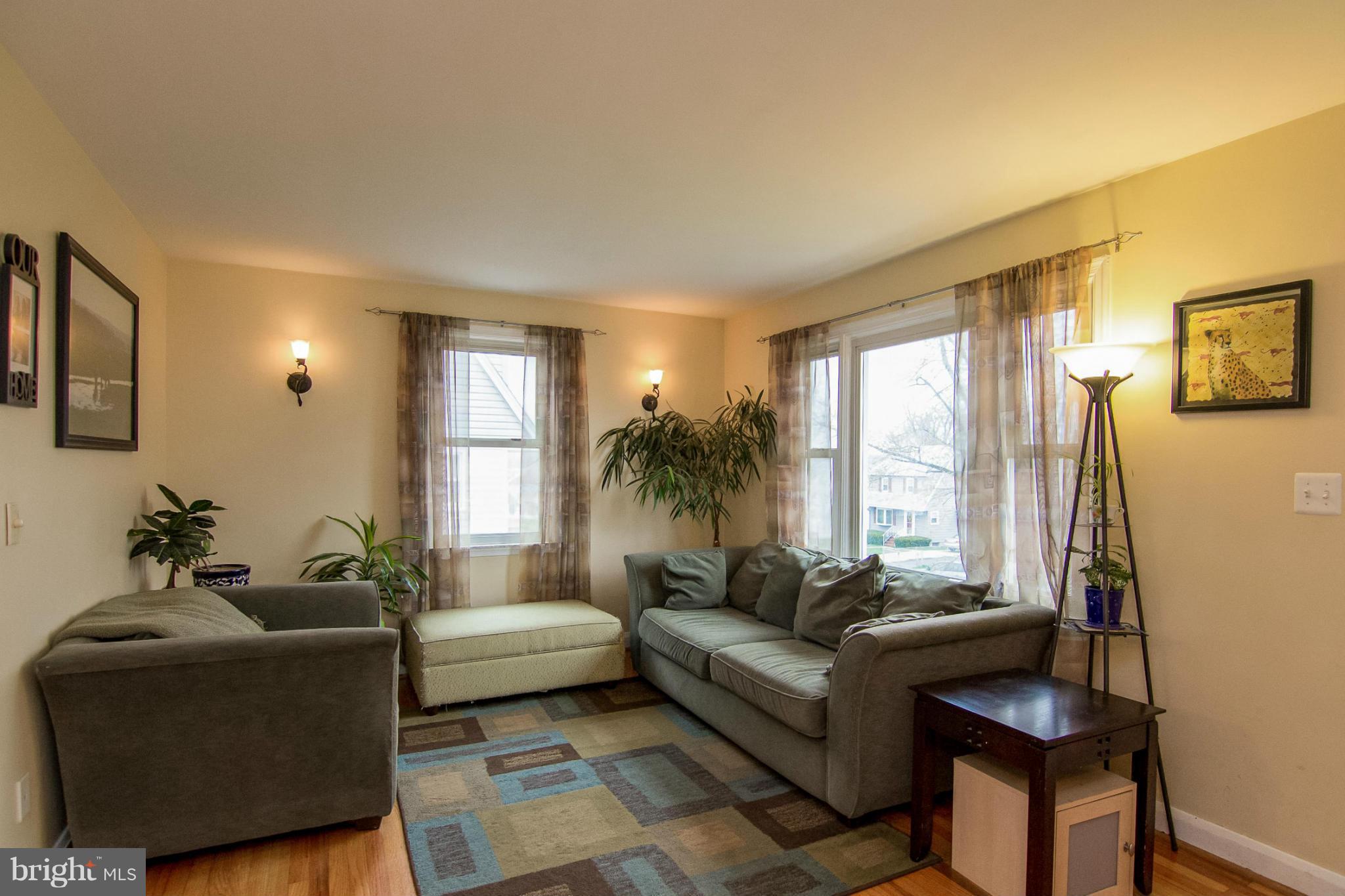5544 Gayland Road Baltimore, MD 21227 - Photo 8 of 24 a living room with furniture and a large window