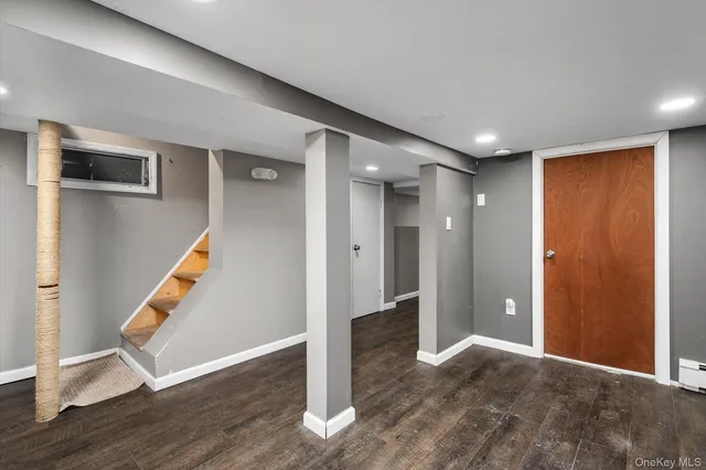 a view of entryway with wooden floor