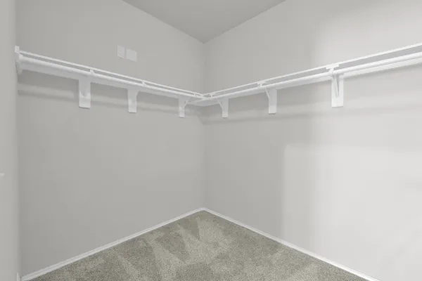 a view of an empty walk in closet