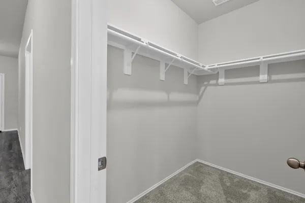 a view of an empty walk in closet