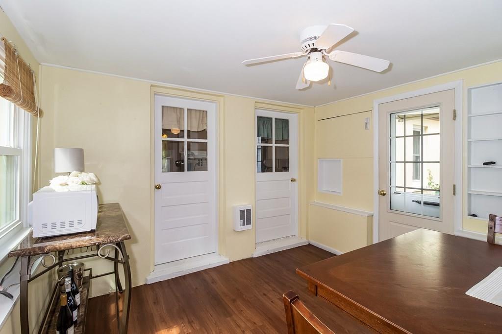 75 Garland Street Springfield, MA 01118 - Photo 15 of 32 a view of an empty room with window and wooden floor