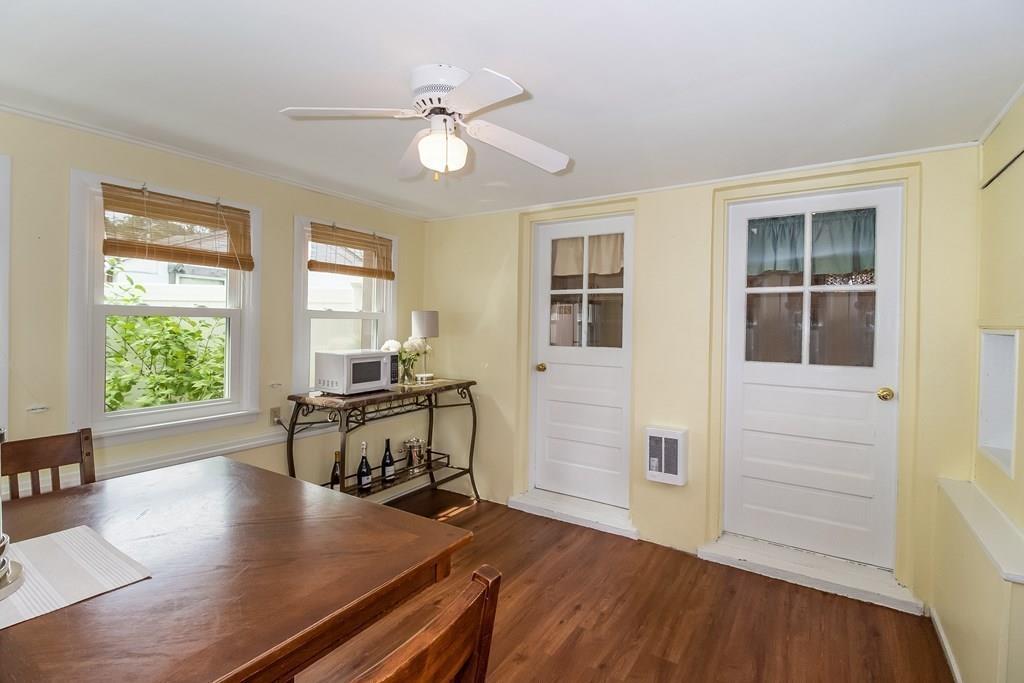 75 Garland Street Springfield, MA 01118 - Photo 17 of 32 a living room with hardwood floor and a ceiling fan