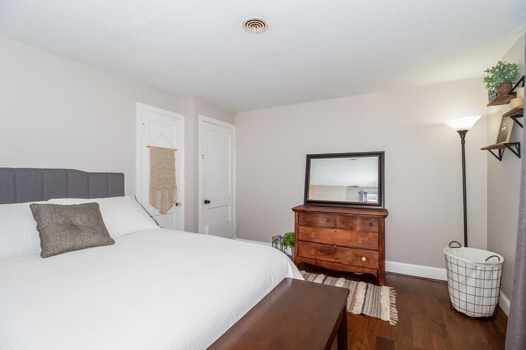 75 Garland Street Springfield, MA 01118 - Photo 20 of 32 a bedroom with a bed and window