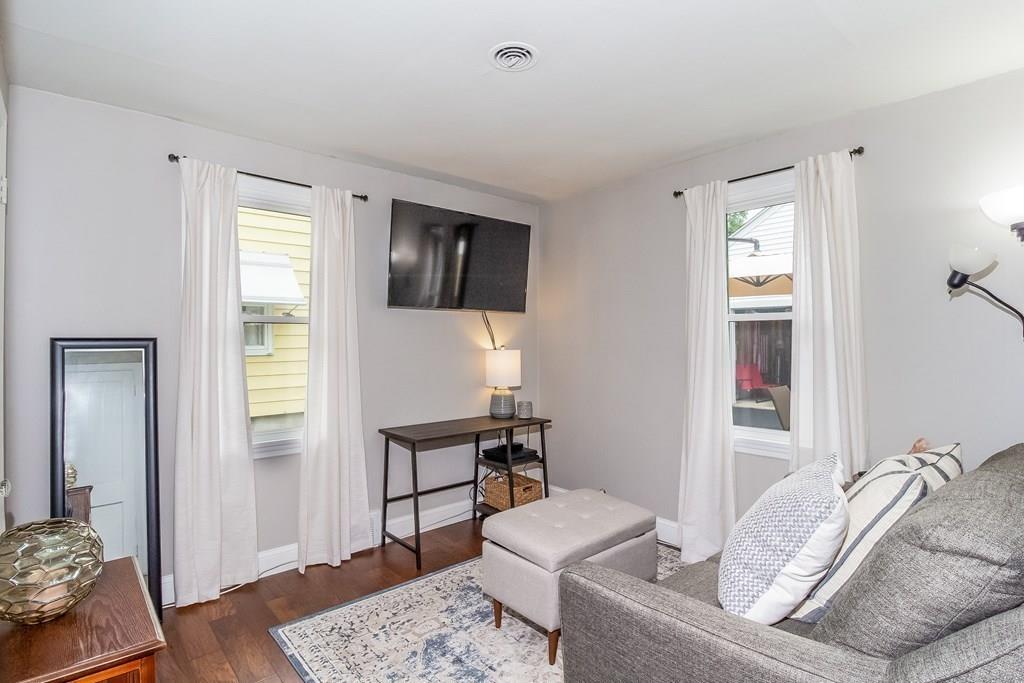 75 Garland Street Springfield, MA 01118 - Photo 21 of 32 a living room with furniture and a window